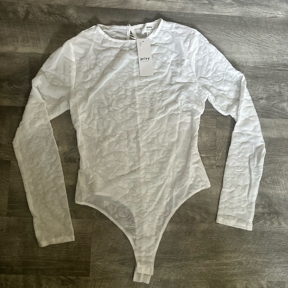 NWT women’s sheer floral white long sleeve bodysuit